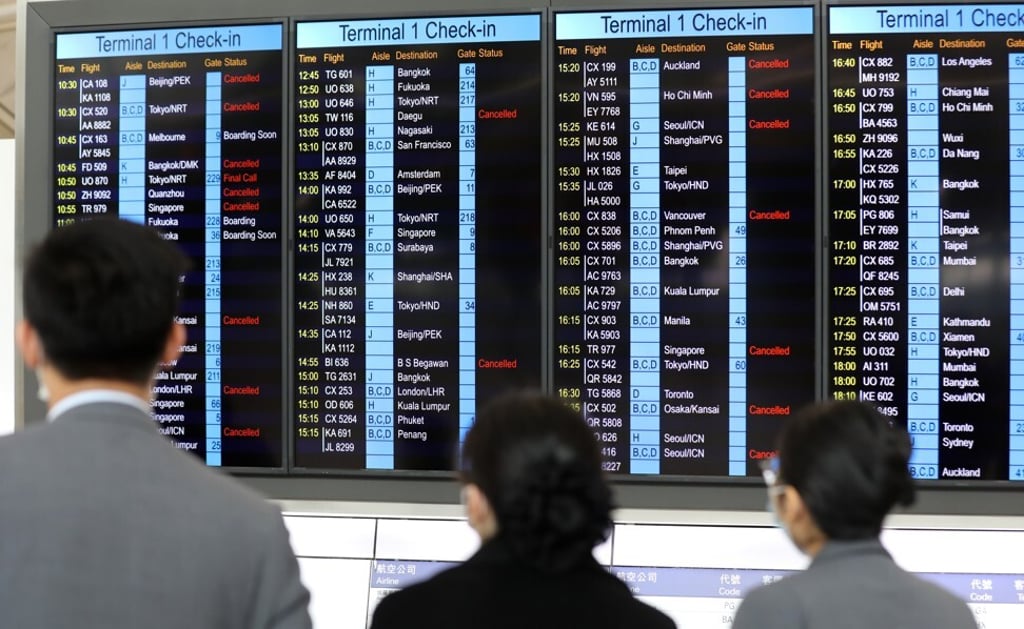 Electronic board shows cancelled departure flights from Hong Kong at the height of coronavirus pandemic this year. Photo: Winson Wong