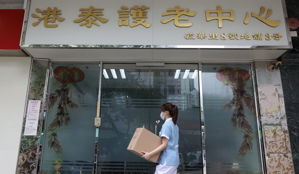 A worker outside the Kong Tai Care for the Aged Centre in Hong Kong’s Tsz Wan Shan area. Photo: K.Y. Cheng A worker outside the Kong Tai Care for the Aged Centre in Hong Kong’s Tsz Wan Shan area. Photo: K.Y. Cheng
