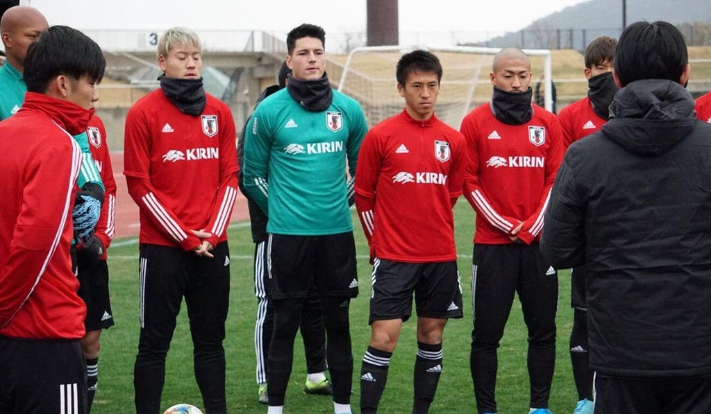 French-Japanese goalkeeper Louis Yamaguchi (centre) listens in with Japan national teammates in training. Photo: Handout French-Japanese goalkeeper Louis Yamaguchi (centre) listens in with Japan national teammates in training. Photo: Handout