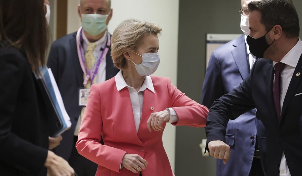 European Commission President Ursula von der Leyen (left) greets Luxembourg's Prime Minister Xavier Bettel with an elbow bump in Brussels on Friday. Photo: AP