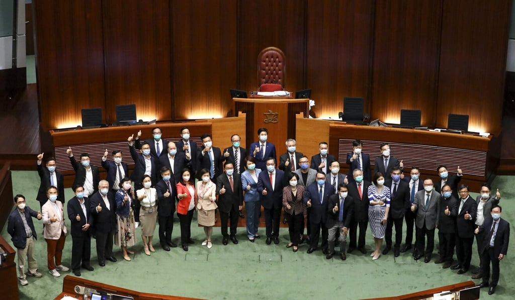 Pro-establishment lawmakers pose for the end-of-year photo at Legco. Photo: Dickson Lee Pro-establishment lawmakers pose for the end-of-year photo at Legco. Photo: Dickson Lee