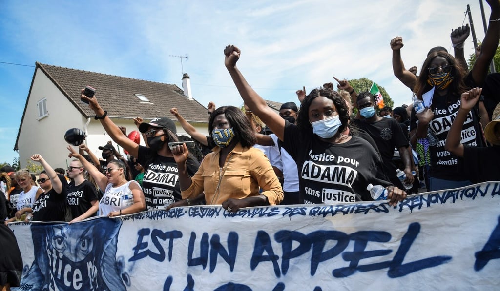 People take part in a march in the Parisian suburban city of Beaumont-sur-Oise. Photo: AFP People take part in a march in the Parisian suburban city of Beaumont-sur-Oise. Photo: AFP