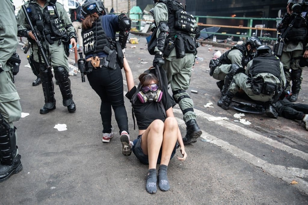 Police arrest anti-government protesters at Hong Kong Polytechnic University on November 18, 2019 in this photo taken by Chor. Photo: Getty Images