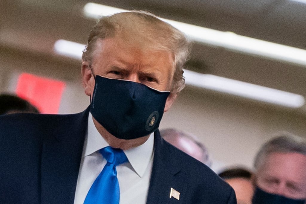 US President Trump wears a mask as he visits Walter Reed National Military Medical Centre in Bethesda, Maryland, the US. Previously, Trump had refused to encourage mask wearing. Photo: AFP US President Trump wears a mask as he visits Walter Reed National Military Medical Centre in Bethesda, Maryland, the US. Previously, Trump had refused to encourage mask wearing. Photo: AFP