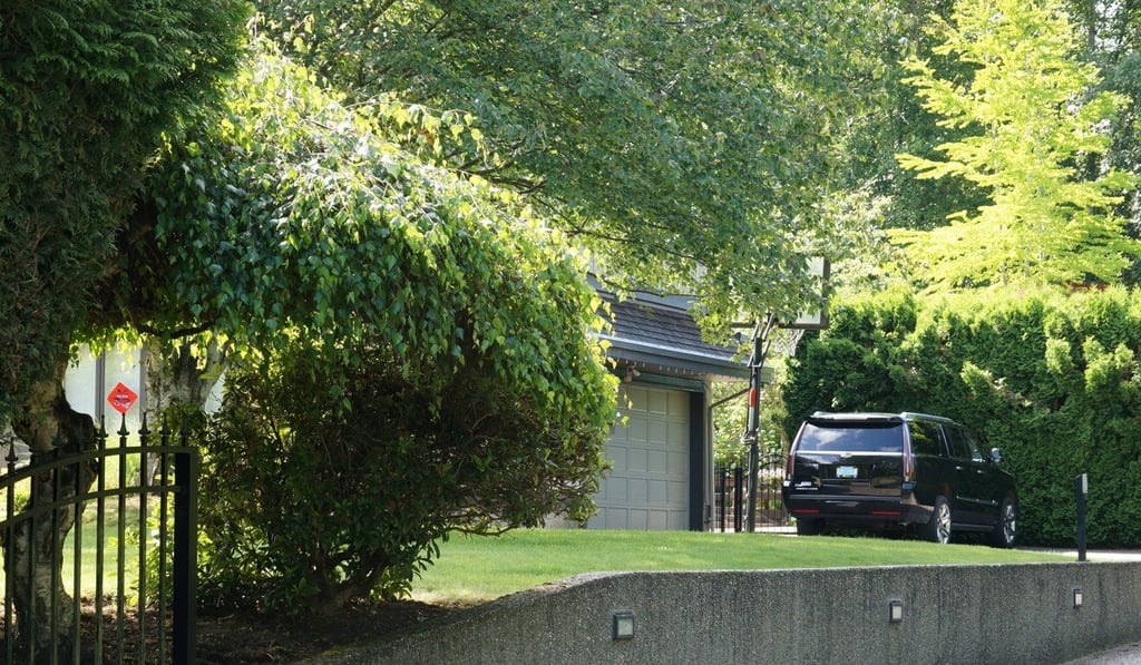 This estate in South Surrey, which was the home of Create Abundance's “Rich Surrey Club”, is owned by a director of two companies linked to the group, one in the Bahamas and one in British Columbia. Photo: Ian Young