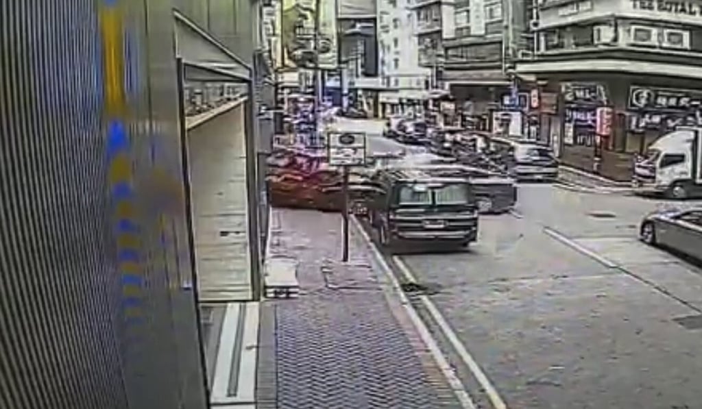 A screen grab of online footage catches the moment the Tesla crashes into the vans. Photo: Handout