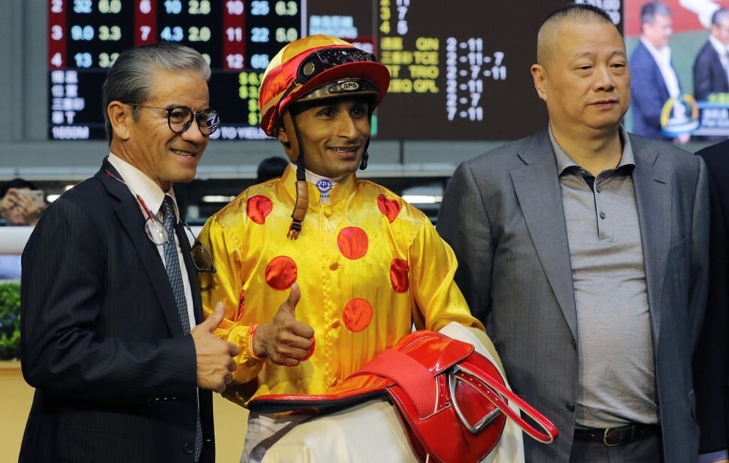 Pan Sutong (right), chairman of Goldin, is a regular at some of Hong Kong’s horse races. Photo: SCMP