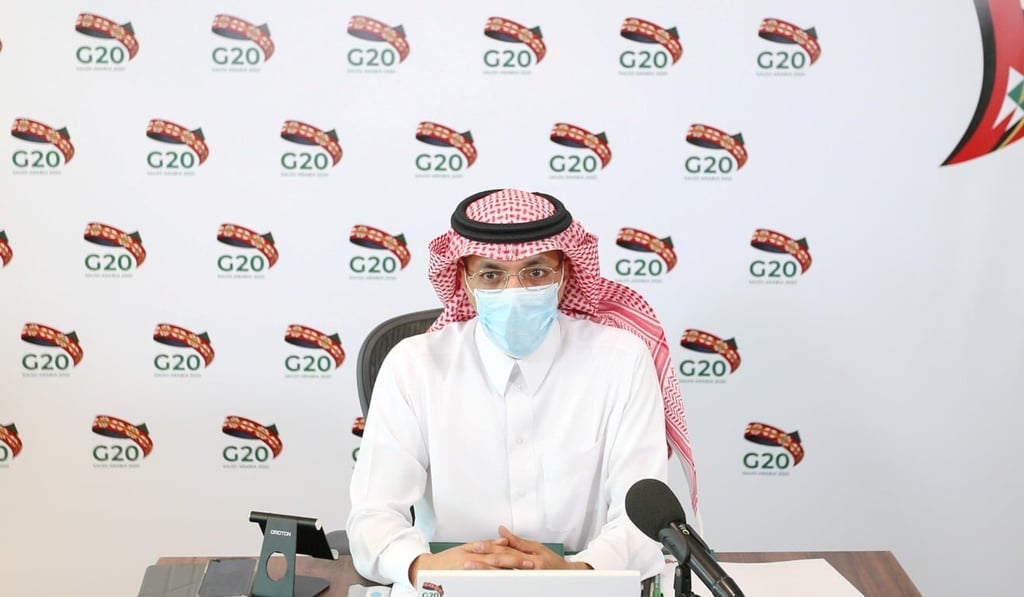 Saudi Minister of Finance Mohammed Al-Jadaan wears a protective mask as he attends a virtual meeting of G20 finance ministers. Photo: Reuters