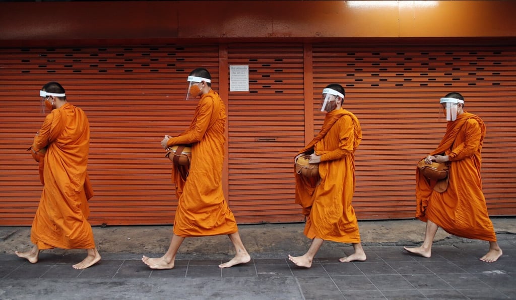 Monks have to turn their backs on wealth. Photo: EPA-EFE Monks have to turn their backs on wealth. Photo: EPA-EFE