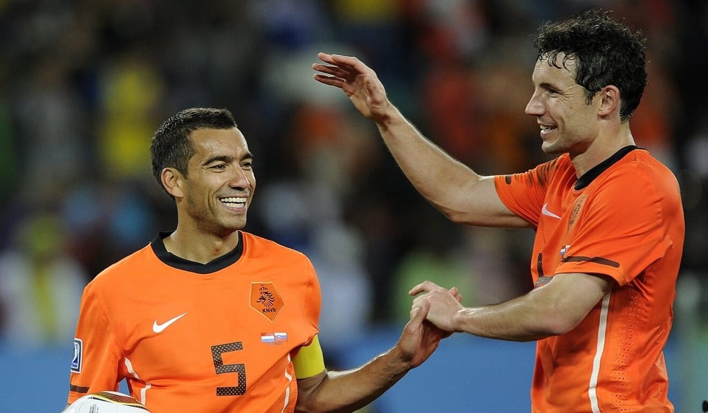 Giovanni van Bronckhorst (left) and Mark van Bommel with the Netherlands during a 2-1 win over Slovakia at the 2010 World Cup. Photo: EPA