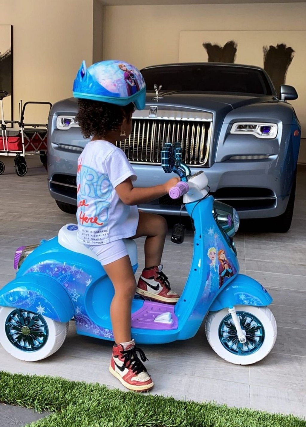 Kylie’s daughter Stormi checking out the new wheels. Photo: @kyliejenner/Instagram