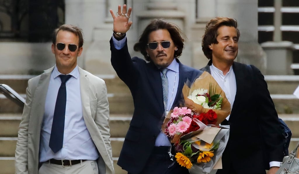 US actor Johnny Depp leaves court after a hearing in his libel trial against News Group Newspapers. Photo: AFP