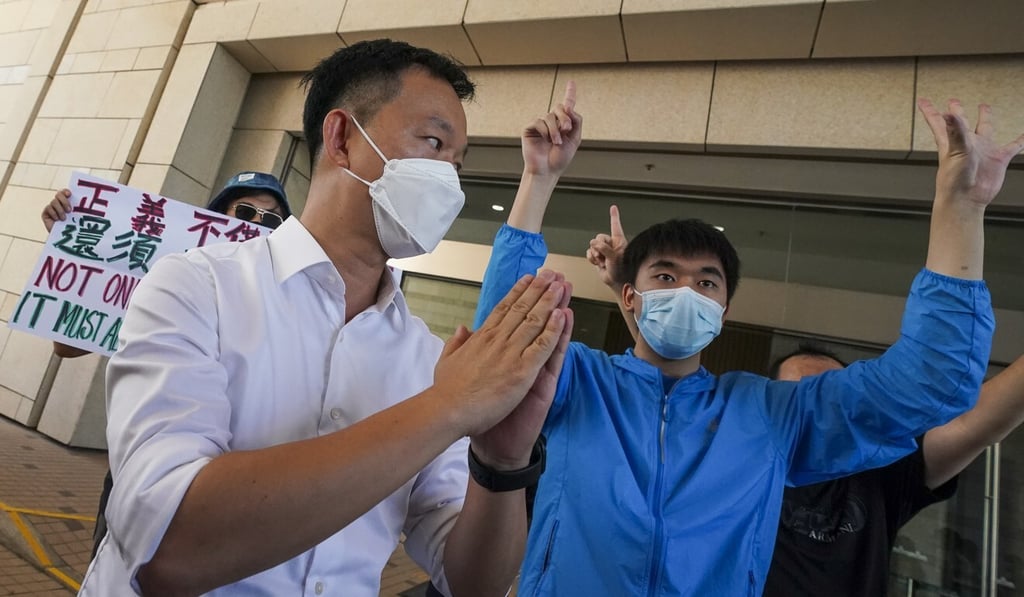 Raymond Chan (left) outside West Kowloon Court on Monday. Photo: Felix Wong