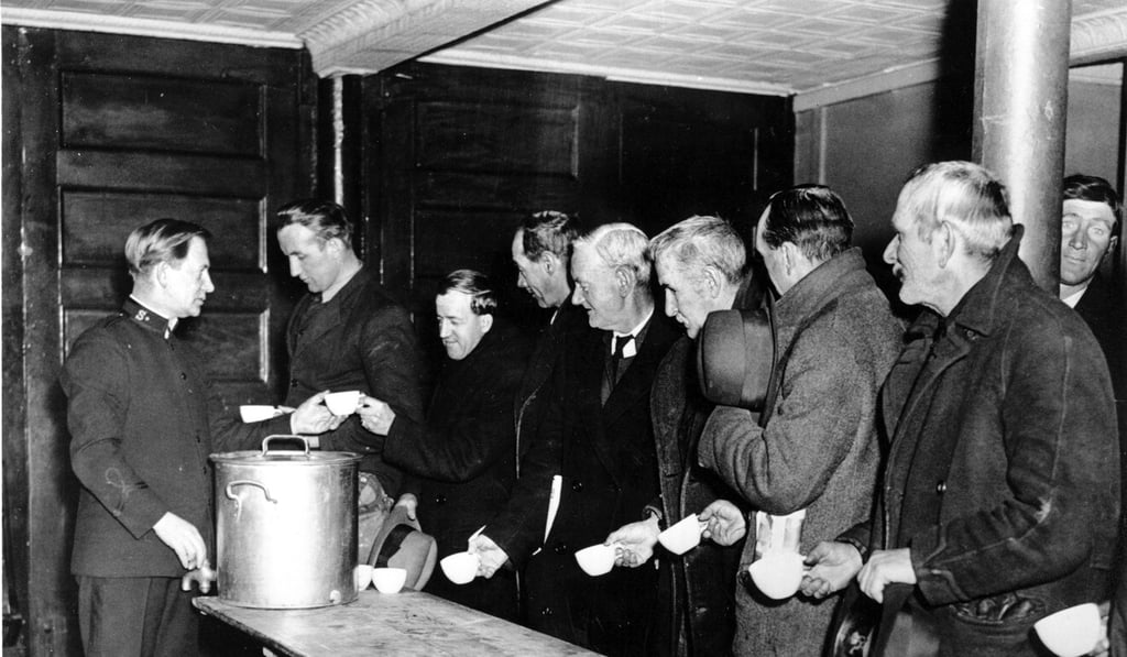 A Salvation Army relief worker tends to a line at a local soup kitchen during the Great Depression. Photo: AP A Salvation Army relief worker tends to a line at a local soup kitchen during the Great Depression. Photo: AP