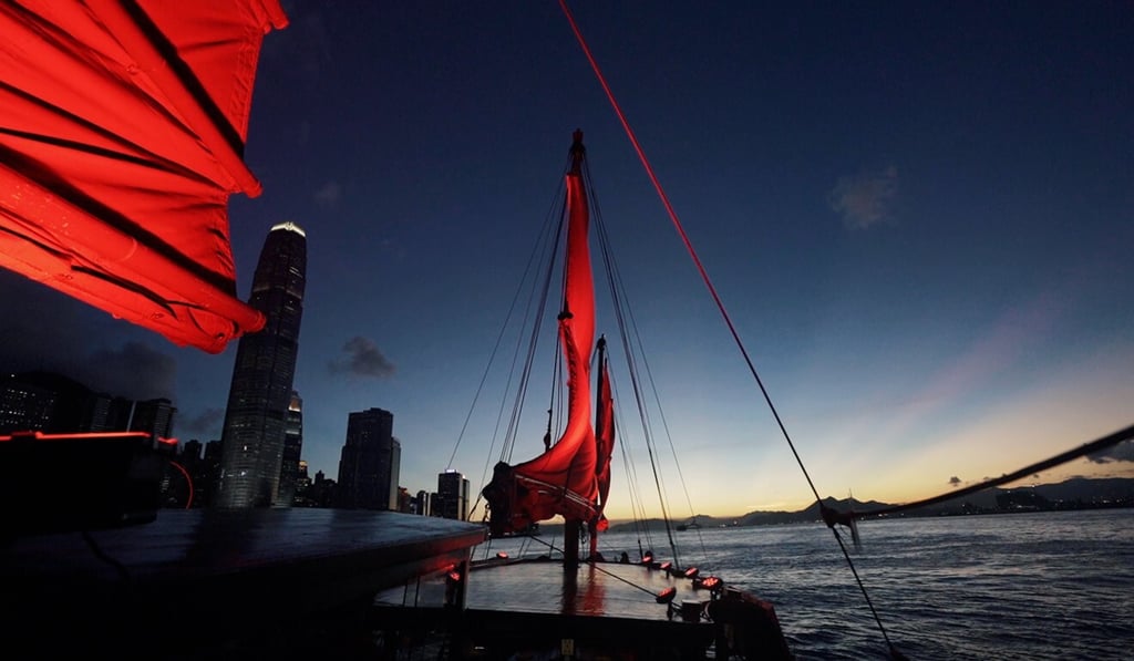 Kwok Wah-hei, captain of Dukling, says he loves to watch the sunset over Hong Kong’s Victoria Harbour while on the boat.