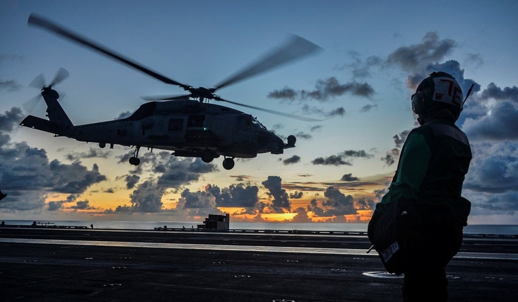A Sea Hawk helicopter takes off from the US Navy aircraft carrier USS Ronald Reagan in the South China Sea earlier this month. The disputed waterway is seen as a likely flashpoint. Photo: Handout via Reuters