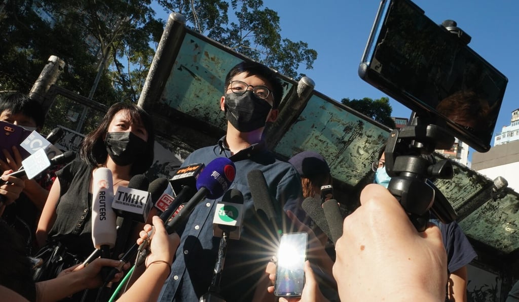 Jannelle Rosalynne Leung (left) and Joshua Wong speak to the press in Kwun Tong. Photo: Felix Wong