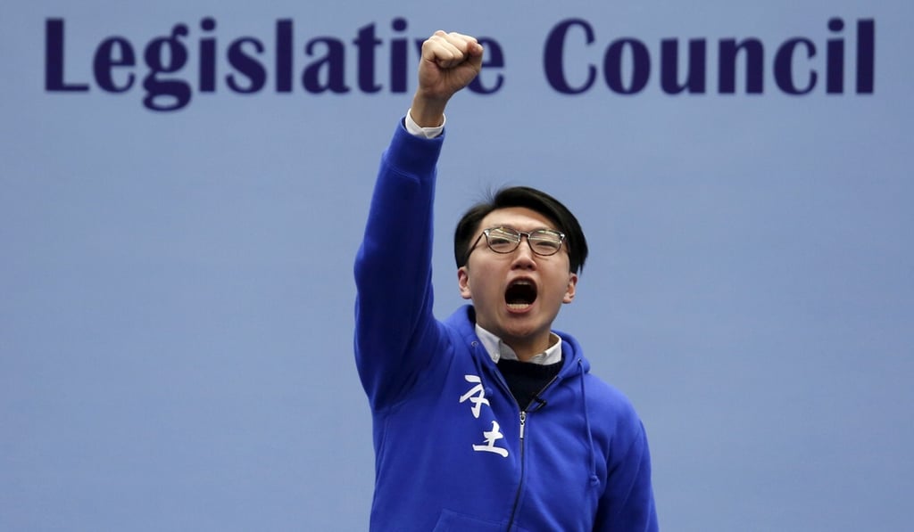 Localist student leader Edward Leung, a candidate from Hong Kong Indigenous, chants slogans on the podium before the final poll results are announced in Hong Kong in 2016. Photo: Reuters Localist student leader Edward Leung, a candidate from Hong Kong Indigenous, chants slogans on the podium before the final poll results are announced in Hong Kong in 2016. Photo: Reuters