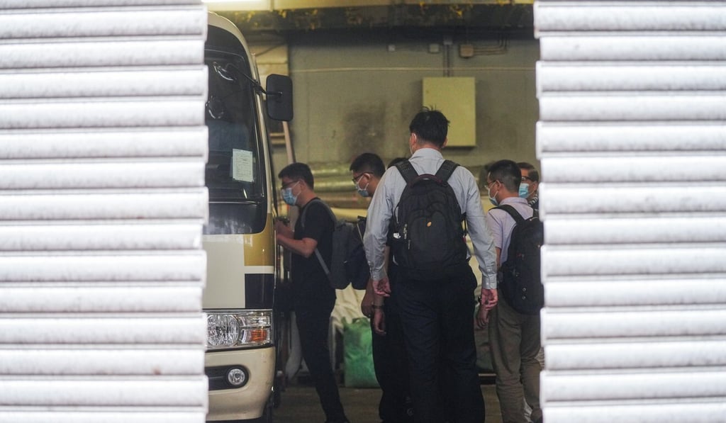 A mainland health expert sent to help Hong Kong deal with its third wave of Covid-19 is seen leaving the Metropark Hotel Kowloon on Tuesday. Photo: Sam Tsang