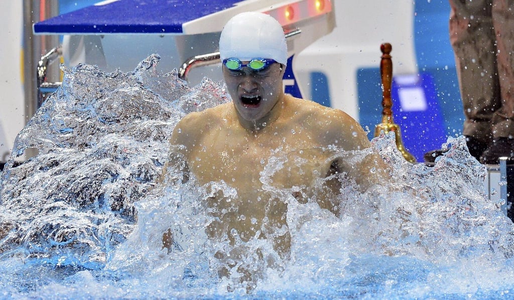 Sun Yang reacts after winning gold in the men’s 1,500m freestyle final in London. Photo: Reuters
