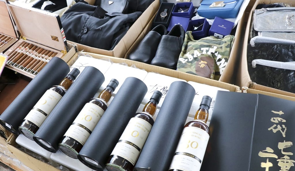 Bottles of high-end Macallan scotch seized in an anti-smuggling operation on Lantau Island on Monday night. Photo: Handout Bottles of high-end Macallan scotch seized in an anti-smuggling operation on Lantau Island on Monday night. Photo: Handout