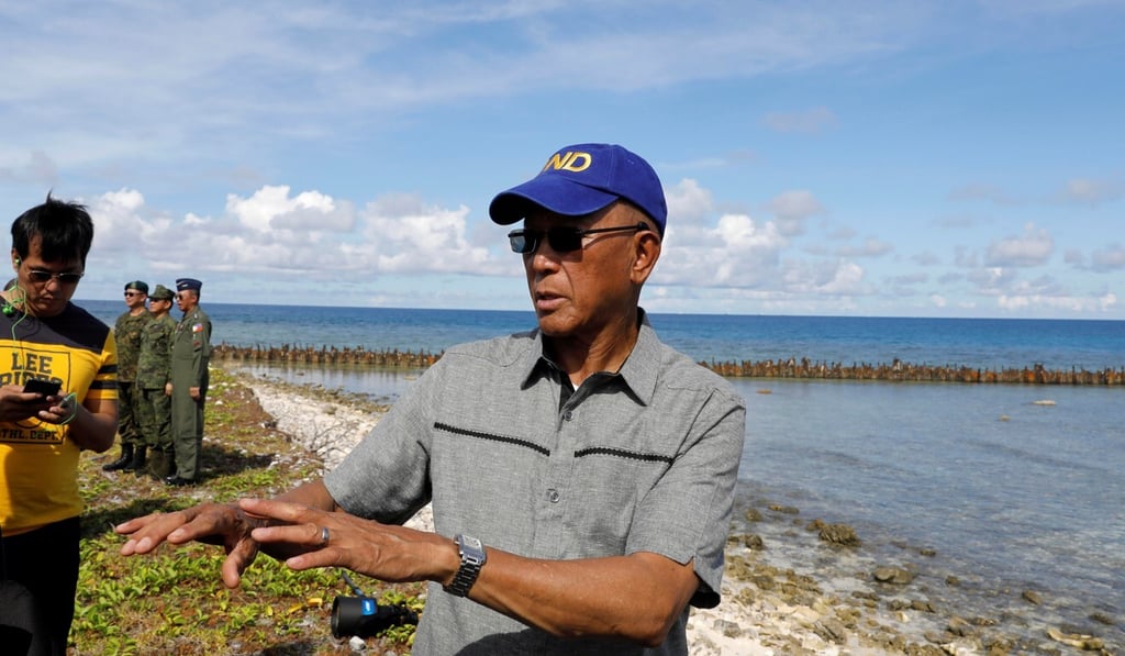 Filipino Defence Secretary Delfin Lorenzana visits Philippine-occupied Thitu Island in the Spratly Islands in the South China Sea. Photo: Reuters Filipino Defence Secretary Delfin Lorenzana visits Philippine-occupied Thitu Island in the Spratly Islands in the South China Sea. Photo: Reuters