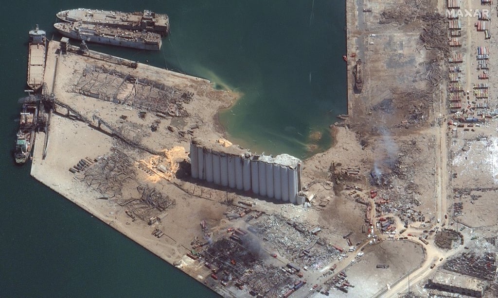 A crater and blast damage is seen at the port on Wednesday. Photo: Satellite image 2020 Maxar Technologies via EPA-EFE