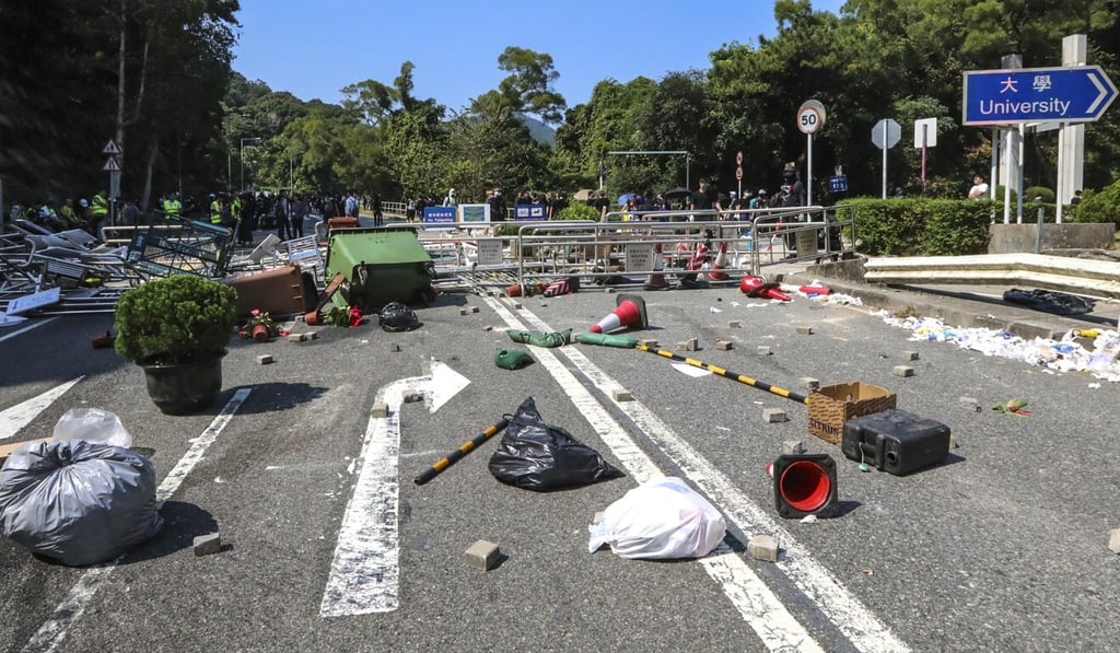 Anti-government protesters set up roadblocks to disrupt traffic outside Chinese University in Sha Tin during an attempted citywide strike on November 11. Photo: Felix Wong Anti-government protesters set up roadblocks to disrupt traffic outside Chinese University in Sha Tin during an attempted citywide strike on November 11. Photo: Felix Wong