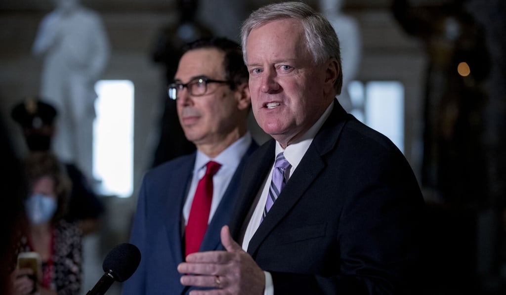 White House Chief of Staff Mark Meadows (right), accompanied by Treasury Secretary Steven Mnuchin, speaks to reporters after a meeting with Democrat leaders in Washington on Friday. Photo: AP