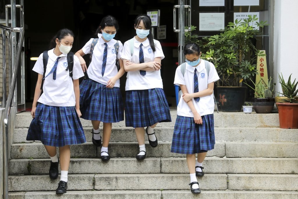 Secondary school students leave their campus on July 10. The ban on face-to-face teaching at Hong Kong schools has been extended indefinitely beyond August 17. Photo: Dickson Lee