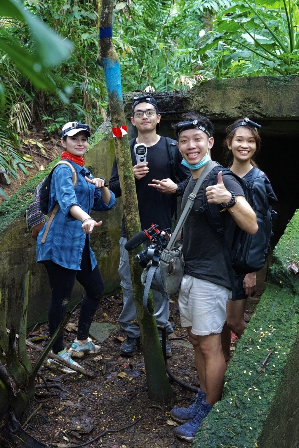 Beyond Expeditions team members get ready to explore an underground bunker in the northern part of Singapore. Photo: Beyond Expeditions Singapore