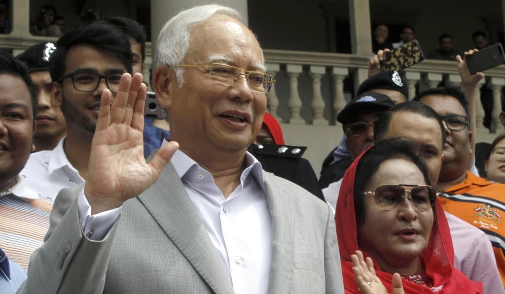 Former Malaysian Prime Minister Najib Razak and his wife, Rosmah Mansor. Photo: AP