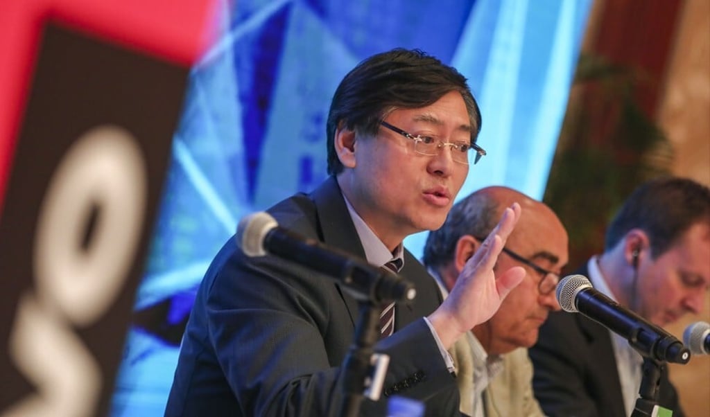 Lenovo Group chairman and chief executive Yang Yuanqing, left, says the company is capturing new opportunities emerging from remote working, education and accelerated digitalisation. Photo: Jonathan Wong