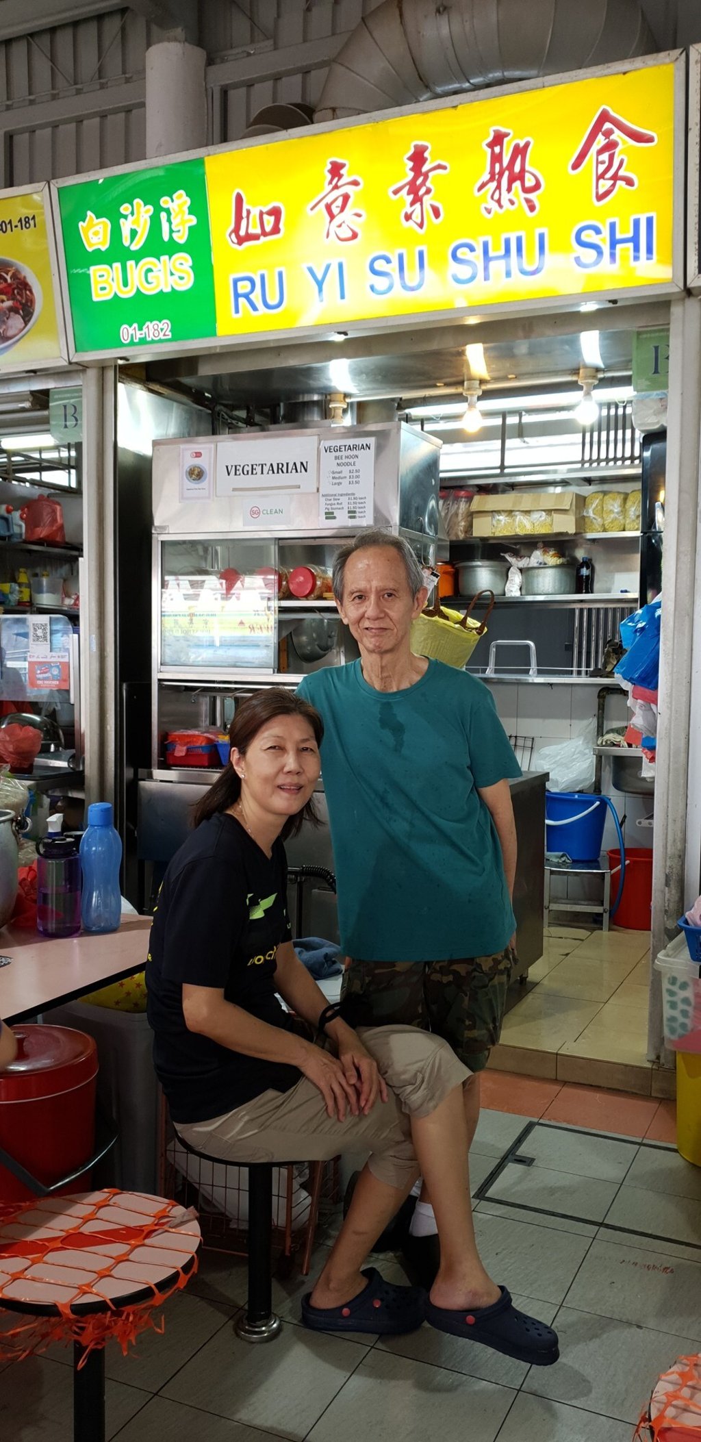 Philip Leong and his wife at their vegetarian bee hoon stall. Photo: Jacqueline Woo