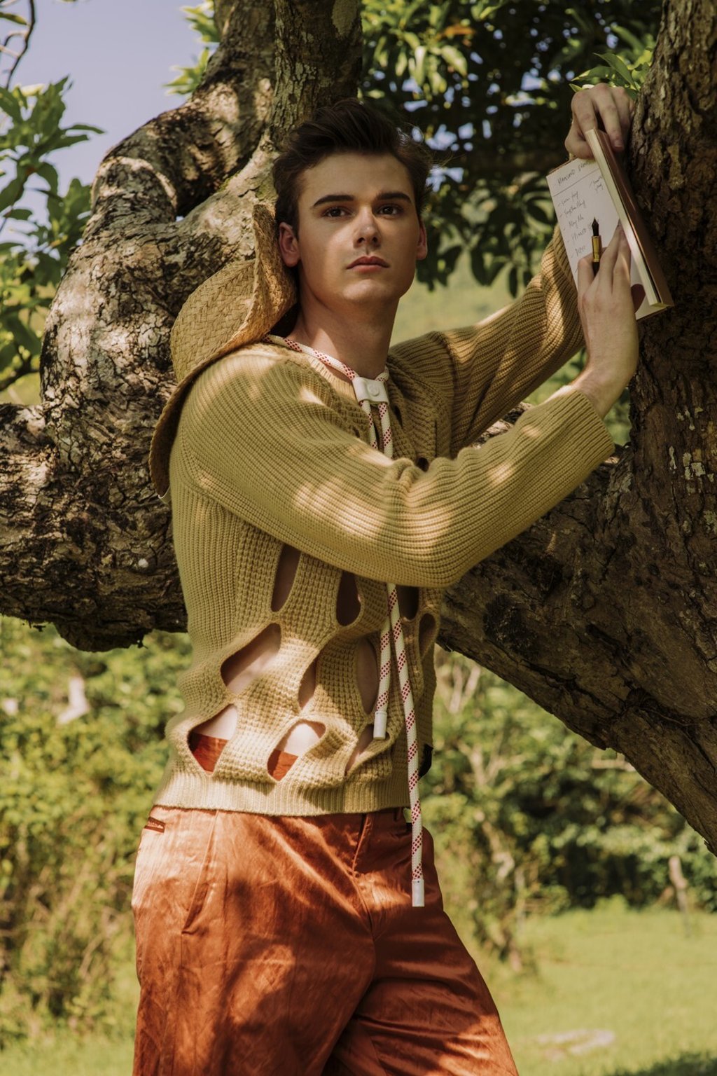 Fendi top, price upon request; Emporio Armani pants, HK$5,900 (US$761); Bottega Veneta shoes, HK$6,400; Louis Vuitton hat, HK$8,650; Montblanc pen, HK$16,200.