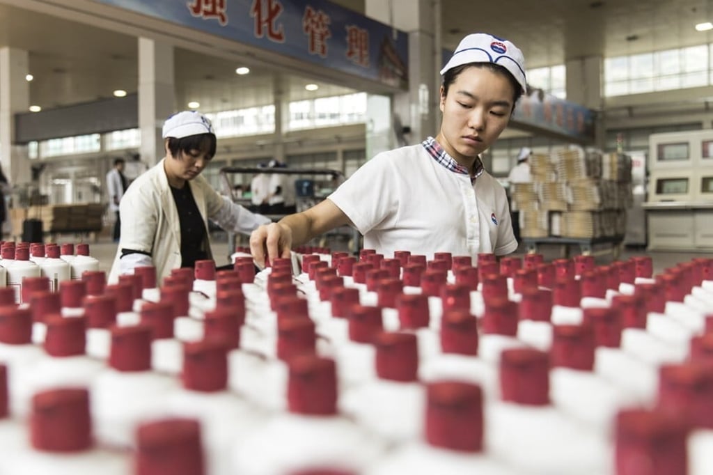Employees arrange bottles of baijiu at the Kweichow Moutai factory in the town of Maotai, Guizhou Province, China. Photo: Bloomberg Employees arrange bottles of baijiu at the Kweichow Moutai factory in the town of Maotai, Guizhou Province, China. Photo: Bloomberg