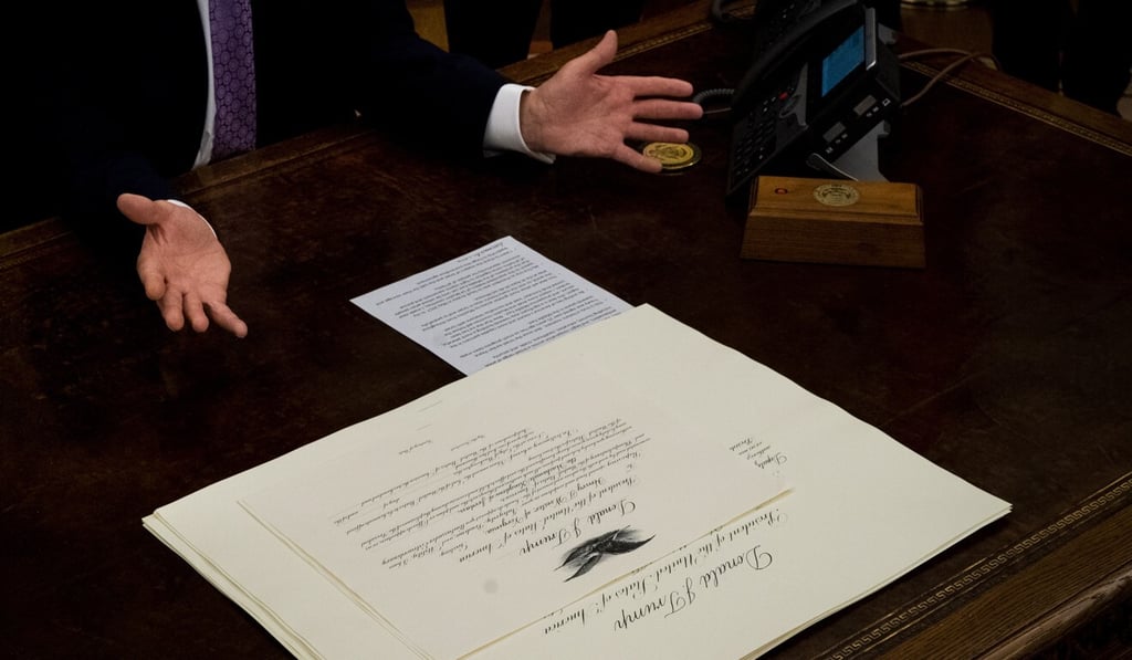 US President Donald Trump announces a peace agreement between Israel and the United Arab Emirates in Washington on Thursday. Photo: EPA-EFE