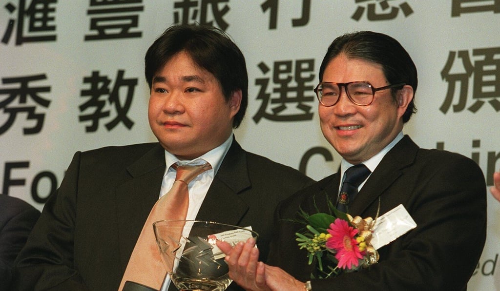 Tony Choi, one of the 2001 Coach of the Year award winners, with Timothy Fok Tsun-ting, president of Hong Kong Olympic Committee, at the prize presentation. Photo: Handout
