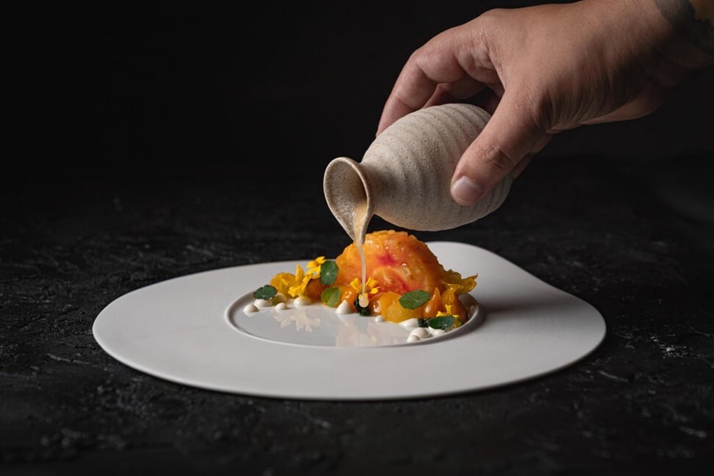 Yellow pineapple tomato, tofu-burrata, Japanese mango and physalis, served at Ando. Photo: Ando