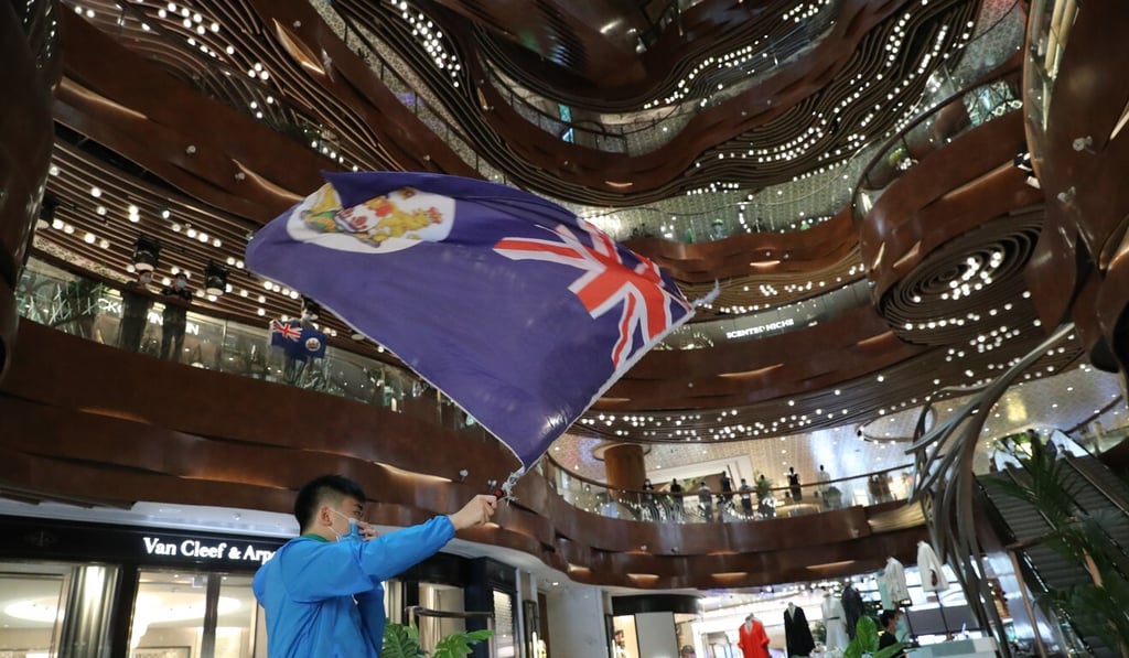 The British Hong Kong colonial flag makes an appearance at a protest in Tsim Sha Tsui. Photo: Edmond So The British Hong Kong colonial flag makes an appearance at a protest in Tsim Sha Tsui. Photo: Edmond So
