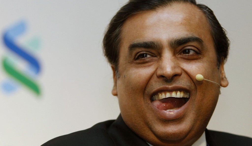 Mukesh Ambani has plenty to smile about. Photo: Reuters