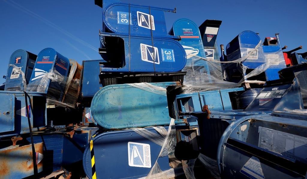 US Postal Service mailboxes are stacked in a storage lot in Hartford, Wisconsin, on Sunday. Nearby residents said the pile had grown noticeably larger in recent weeks. Photo: Reuters US Postal Service mailboxes are stacked in a storage lot in Hartford, Wisconsin, on Sunday. Nearby residents said the pile had grown noticeably larger in recent weeks. Photo: Reuters