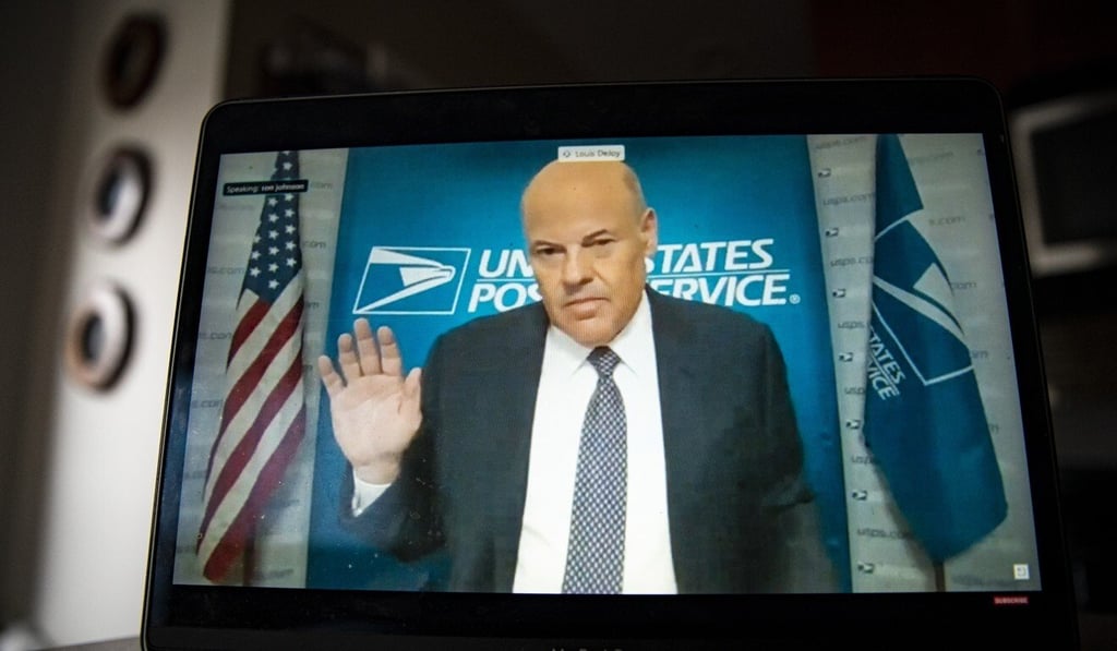 Louis DeJoy, Postmaster General of the US Postal Service, is virtually sworn in during a Senate Homeland and Governmental Security Committee hearing. Photo: Bloomberg Louis DeJoy, Postmaster General of the US Postal Service, is virtually sworn in during a Senate Homeland and Governmental Security Committee hearing. Photo: Bloomberg