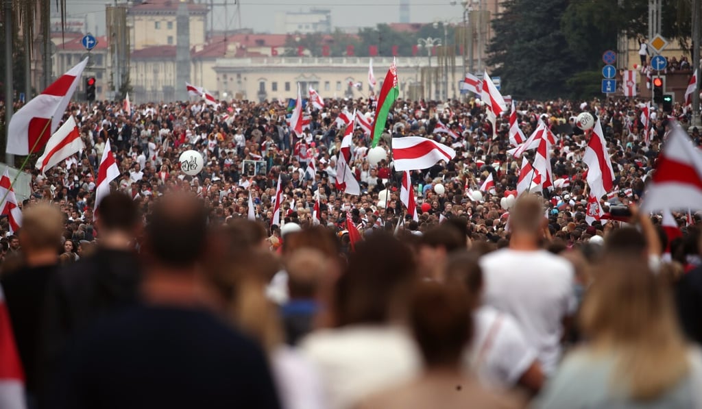 People attend a protest on Sunday against the results of the presidential elections in Minsk. Photo: EPA