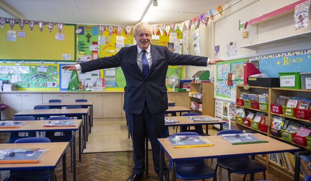 Britain's Prime Minister Boris Johnson visits St Joseph's Catholic Primary School in London on August 10 to look at their Covid-19 measures. Photo: AP Britain's Prime Minister Boris Johnson visits St Joseph's Catholic Primary School in London on August 10 to look at their Covid-19 measures. Photo: AP