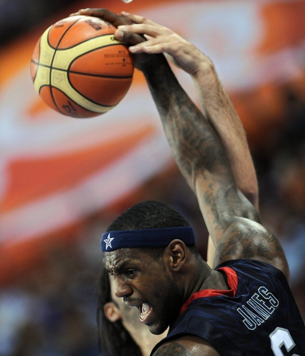 Team USA's LeBron James catches the ball during the men's semi-final match against Argentina. Photo: AFP