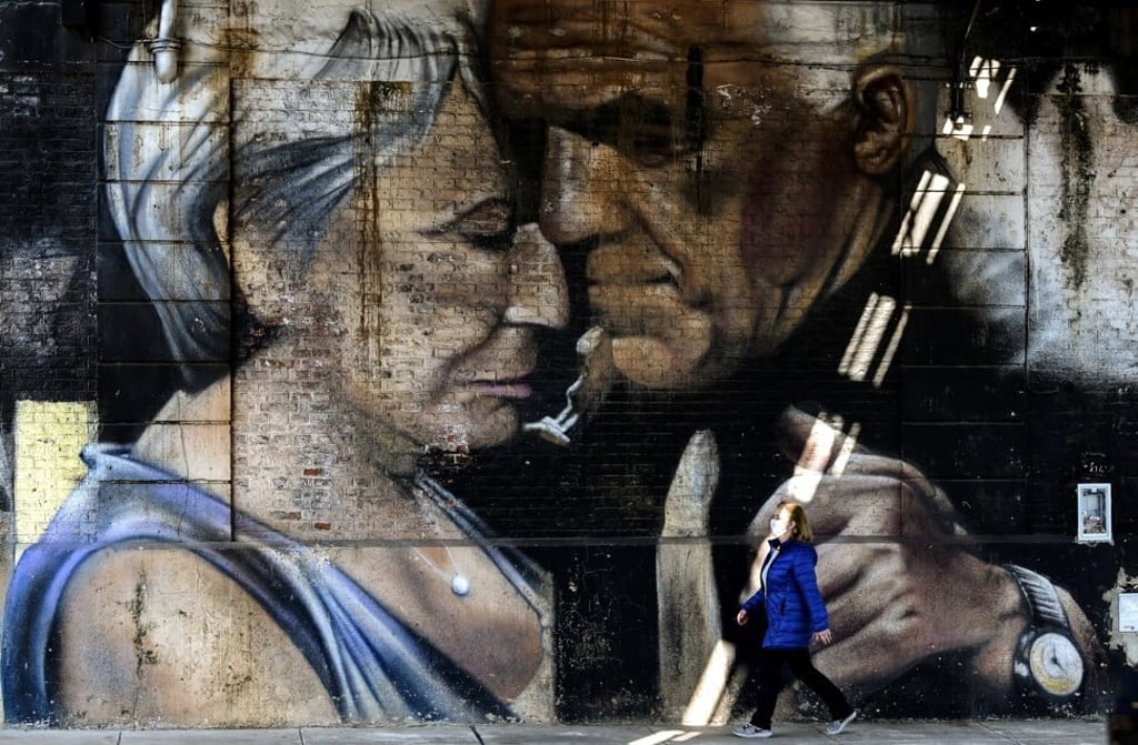 A mural with the image of a couple dancing tango in Buenos Aires. Photo: AFP