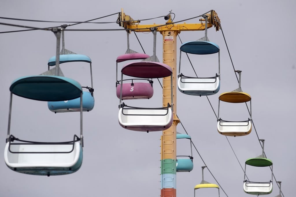 An empty chairlift above the Santa Cruz Beach Boardwalk in California on July 2. The US economy contracted by an annualised 32.9 per cent in the second quarter of 2020, the sharpest quarterly decline on record. Photo: AP An empty chairlift above the Santa Cruz Beach Boardwalk in California on July 2. The US economy contracted by an annualised 32.9 per cent in the second quarter of 2020, the sharpest quarterly decline on record. Photo: AP