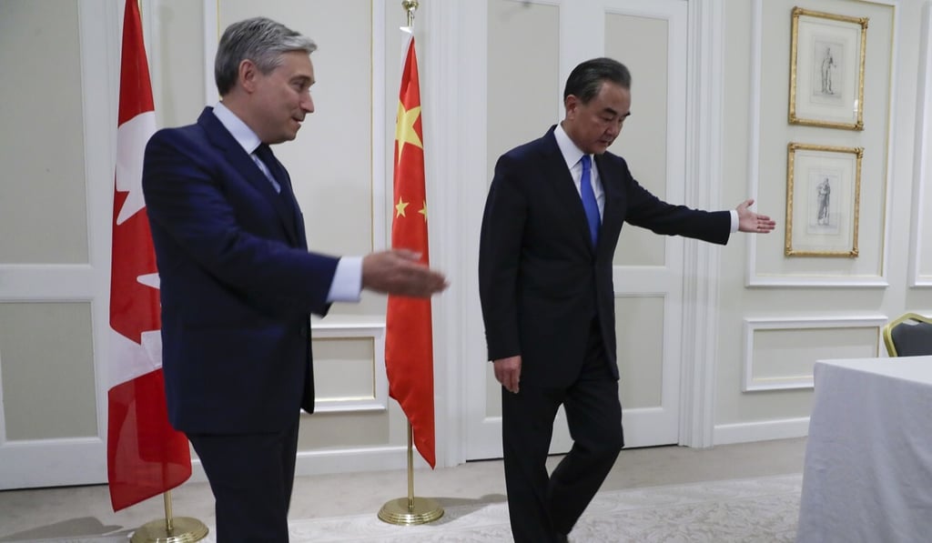 Canadian Foreign Minister Francois-Philippe Champagne and Chinese Foreign Minister Wang Yi meet in Rome on Tuesday. Photo: AP Canadian Foreign Minister Francois-Philippe Champagne and Chinese Foreign Minister Wang Yi meet in Rome on Tuesday. Photo: AP