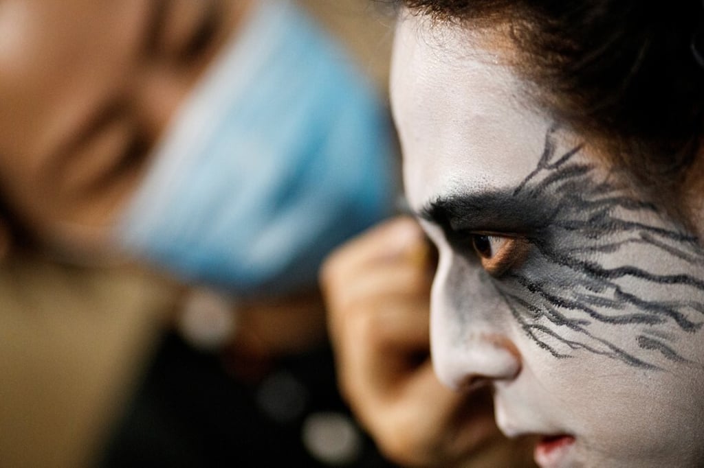 Zhang Xiao Song of Bliss-Illusion has his make-up done before the concert. Photo: Reuters/Thomas Peter Zhang Xiao Song of Bliss-Illusion has his make-up done before the concert. Photo: Reuters/Thomas Peter
